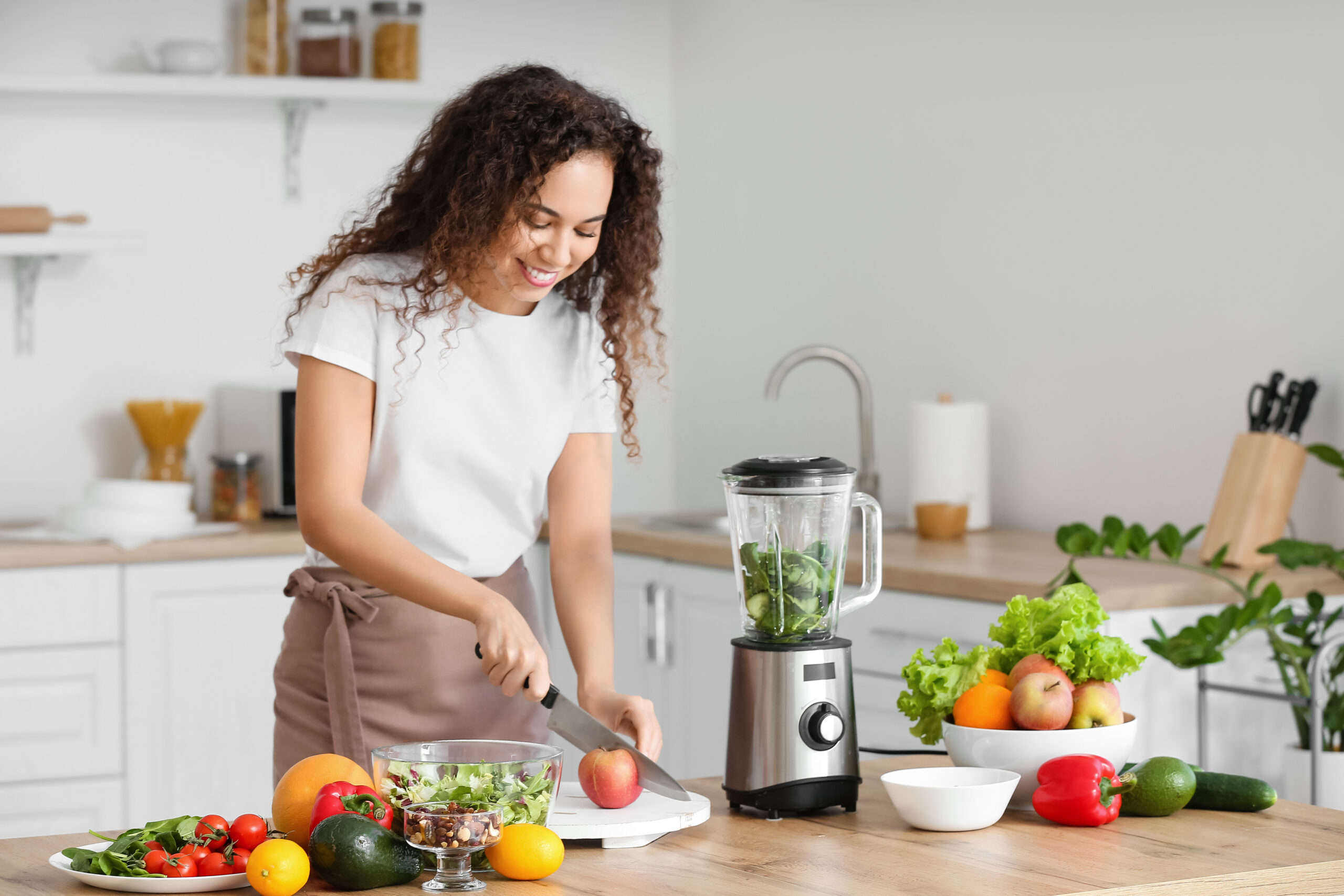 Surrogate preparing health meals for a safe and healthy pregnancy.