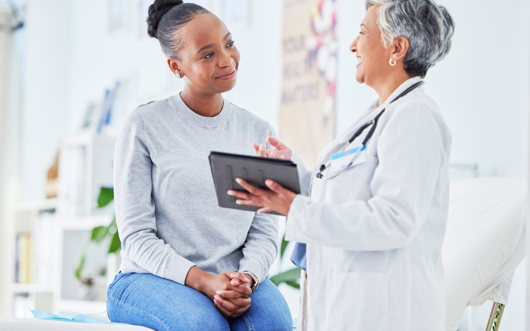 Surrogate during her health-screening with doctor.