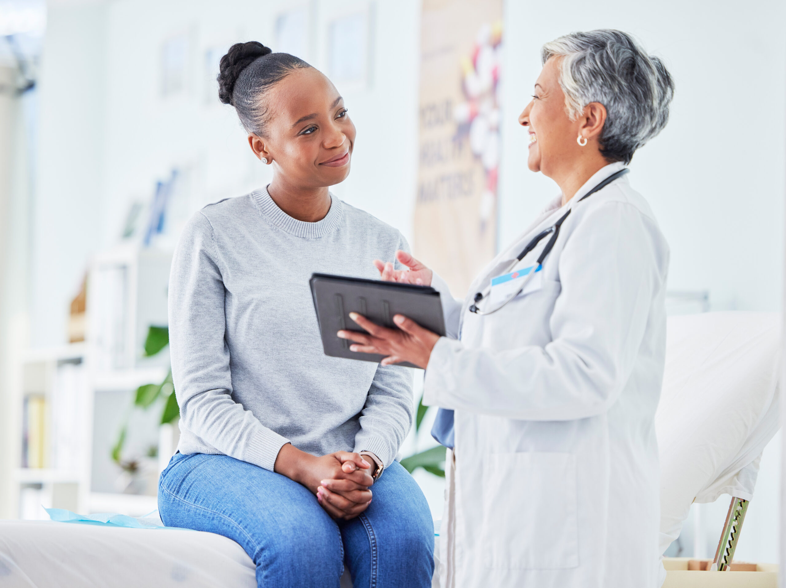 Surrogate during her health-screening with doctor.